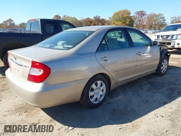✅ 2003 Toyota Camry LE • VIN: 4T1BE32K93U180713 • Lot: 43672253. Listed on IAAI with 162,985 mi. Free auction sales archive from the USA and detailed vehicle history report at DreamBid. Image 4.