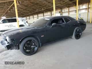 2014 Dodge Challenger R/T 100th Anniversary Appearance z VIN 2C3CDYBT4EH306312, wystawiony jako Copart lot #61217864 z przebiegiem 79 905 mil mil oraz Szkoda całkowita • Salvage title. Historia ofert i sprzedaży dostępna na DreamBid. Obrazek 1.