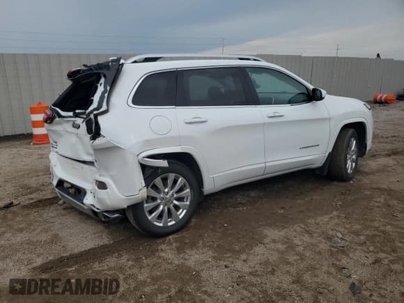 ✅ 2017 Jeep Cherokee Overland • VIN: 1C4PJMJS6HW544868 • Lot: 71194055. Listed on Copart with 112,744 mi. Free auction sales archive from the USA and detailed vehicle history report at DreamBid. Image 3.