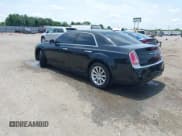 ✅ 2012 Chrysler 300 C • VIN: 2C3CCAET4CH288784 • Lot: 39522457. Listed on IAAI with 185,234 mi. Free auction sales archive from the USA and detailed vehicle history report at DreamBid. Image 3.