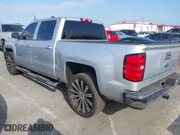 2018 Chevrolet Silverado 1500 LT with VIN 3GCPCREC8JG580088, listed as a IAAI auction lot 43278290 with 72,832 mi miles and . Bid and sale history available at DreamBid. Image 3.