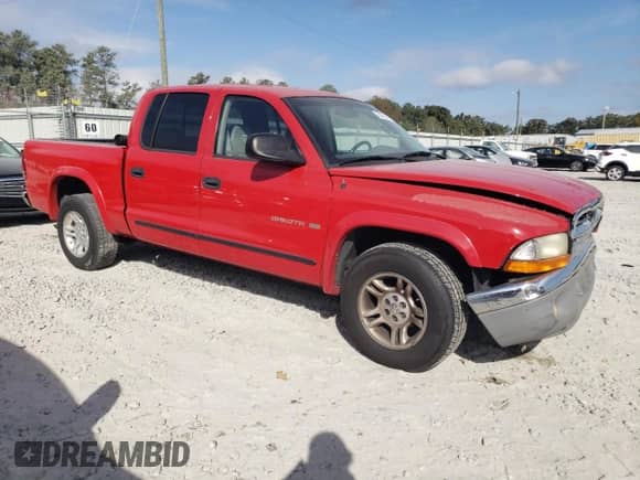 2002 Dodge Dakota SLT с VIN 1B7HL48N62S558993, выставлен на аукционе Copart как лот 78365374 с пробегом 196 423 миль миль и Списание • Salvage title. История ставок и продаж доступна на DreamBid. Изображение 4.