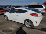 ✅ 2015 Hyundai Veloster • VIN: KMHTC6ADXFU238847 • Lot: 77261904. Wystawiony na Copart z przebiegiem 139 587 mil. Bezpłatny archiwum sprzedaży aukcyjnych z USA i szczegółowy raport historii pojazdu na DreamBid. Zdjęcie 2.