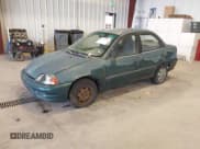 ✅ 1998 Chevrolet Metro Lsi • VIN: 2C1MR5225W6734147 • Лот: 43727340. Опубликован ранее на IAAI с пробегом 213 033 миль. Бесплатный доступ к архиву аукционных продаж из США и подробный отчёт об истории автомобиля на DreamBid. Изображение 2.