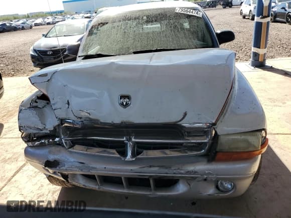 ✅ 2004 Dodge Dakota SLT • VIN: 1D7GL42K14S527380 • Lot: 79564474. Wystawiony na Copart z przebiegiem 150 389 mil. Bezpłatny archiwum sprzedaży aukcyjnych z USA i szczegółowy raport historii pojazdu na DreamBid. Zdjęcie 5.