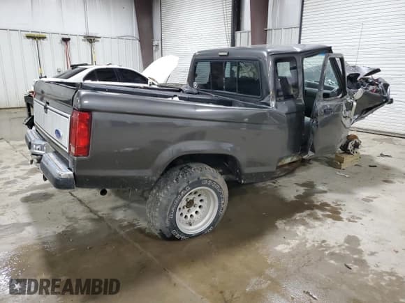 ✅ 1989 Ford Ranger • VIN: 1FTCR15T1KPB01716 • Lot: 54721875. Listed on Copart with 64,486 mi. Free auction sales archive from the USA and detailed vehicle history report at DreamBid. Image 3.