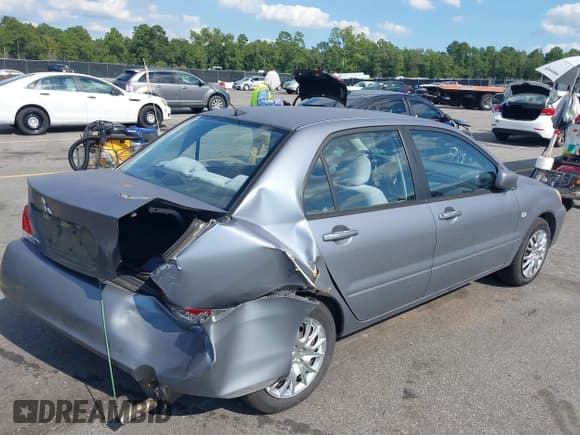✅ 2006 Mitsubishi Lancer ES • VIN: JA3AJ26EX6U021793 • Lot: 43094711. Listed on IAAI with 136,744 mi. Free auction sales archive from the USA and detailed vehicle history report at DreamBid. Image 4.