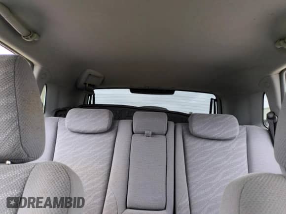 2005 Hyundai Tucson GL z VIN KM8JM12BX5U071182, wystawiony jako Copart lot #74852974 z przebiegiem 74 235 mil mil oraz Szkoda całkowita • Salvage title. Historia ofert i sprzedaży dostępna na DreamBid. Obrazek 10.