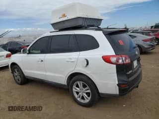 ✅ 2012 Hyundai Santa Fe SE • VIN: 5XYZHDAG7CG099546 • Lot: 71553834. Listed on Copart with Not provided. Free auction sales archive from the USA and detailed vehicle history report at DreamBid. Image 2.