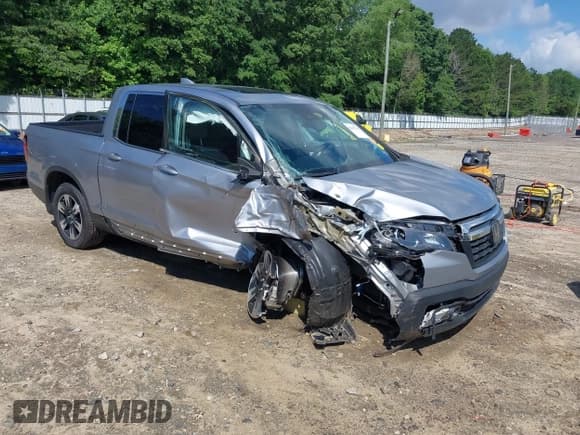 ✅ 2020 Honda Ridgeline RTL • VIN: 5FPYK3F5XLB025857 • Lot: 42307343. Listed on IAAI with 97,262 mi. Free auction sales archive from the USA and detailed vehicle history report at DreamBid. Image 1.