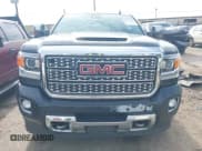 ✅ 2018 GMC Sierra 2500HD Denali • VIN: 1GT12UEY9JF257743 • Лот: 42712425. Опубликован ранее на IAAI с пробегом Не указан. Бесплатный доступ к архиву аукционных продаж из США и подробный отчёт об истории автомобиля на DreamBid. Изображение 12.