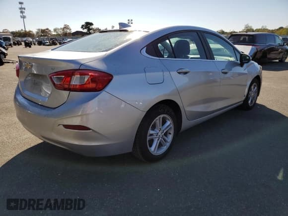 ✅ 2017 Chevrolet Cruze LT • VIN: 1G1BE5SM9H7219297 • Lot: 64232272. Listed on Copart with 64,316 mi. Free auction sales archive from the USA and detailed vehicle history report at DreamBid. Image 4.