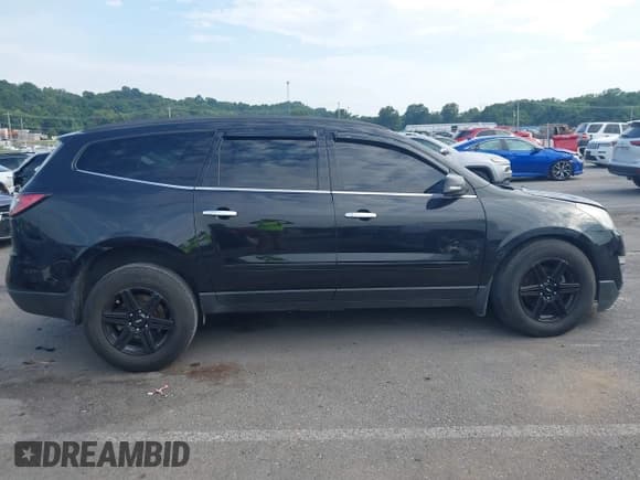 ✅ 2015 Chevrolet Traverse LT • VIN: 1GNKRHKD9FJ198777 • Lot: 42926991. Listed on IAAI with 153,634 mi. Free auction sales archive from the USA and detailed vehicle history report at DreamBid. Image 14.