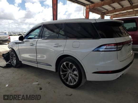 ✅ 2023 Lincoln Aviator Grand Touring • VIN: 5LMYJ8XY3PNL01054 • Лот: 68695705. Опубликован ранее на Copart с пробегом 38 945 миль. Бесплатный доступ к архиву аукционных продаж из США и подробный отчёт об истории автомобиля на DreamBid. Изображение 2.