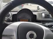 ✅ 2013 Smart fortwo Pure • VIN: WMEEJ3BA0DK722865 • Лот: 43878350. Опубликован ранее на IAAI с пробегом 90 797 миль. Бесплатный доступ к архиву аукционных продаж из США и подробный отчёт об истории автомобиля на DreamBid. Изображение 6.