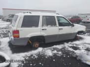 ✅ 1996 Jeep Grand Cherokee Laredo • VIN: 1J4GZ58S2TC387400 • Лот: 43821540. Опубликован ранее на IAAI с пробегом 260 483 миль. Бесплатный доступ к архиву аукционных продаж из США и подробный отчёт об истории автомобиля на DreamBid. Изображение 4.