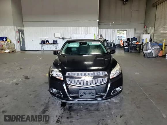 ✅ 2013 Chevrolet Malibu LTZ • VIN: 1G11J5SX6DF349359 • Lot: 85578835. Listed on Copart with 140,851 mi. Free auction sales archive from the USA and detailed vehicle history report at DreamBid. Image 14.