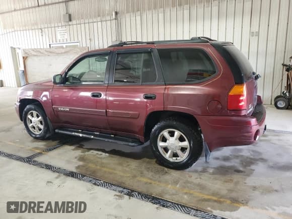 ✅ 2004 GMC Envoy SLE • VIN: 1GKDT13SX42373881 • Lot: 68672365. Listed on Copart with 200,806 mi. Free auction sales archive from the USA and detailed vehicle history report at DreamBid. Image 2.