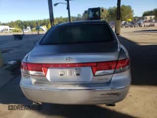 2006 Hyundai Azera SE с VIN KMHFC46F26A036193, выставлен на аукционе Copart как лот 70526753 с пробегом 125 290 миль миль и Списание • Salvage title. История ставок и продаж доступна на DreamBid. Изображение 6.