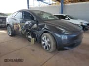 ✅ 2024 Tesla Model Y Long Range • VIN: 7SAYGDEE8RA226005 • Lot: 93294135. Listed on Copart with 15,121 mi. Free auction sales archive from the USA and detailed vehicle history report at DreamBid. Image 4.