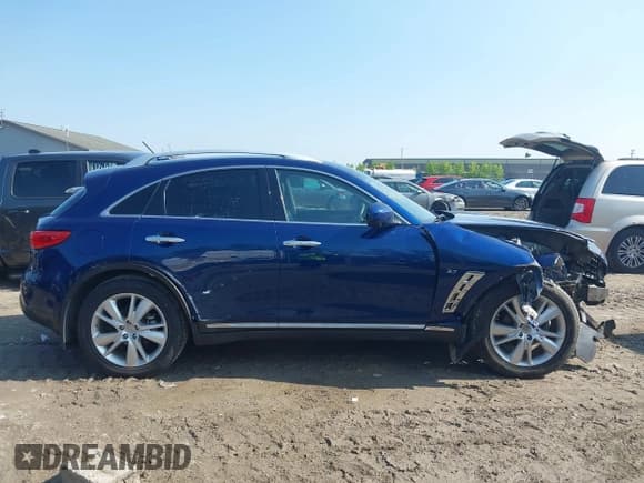 ✅ 2016 Infiniti QX70 • VIN: JN8CS1MW5GM750920 • Lot: 42461404. Listed on IAAI with 145,116 mi. Free auction sales archive from the USA and detailed vehicle history report at DreamBid. Image 13.