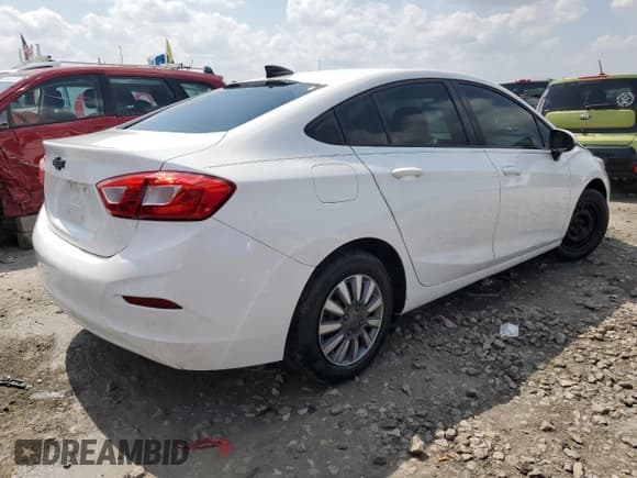 ✅ 2018 Chevrolet Cruze LS • VIN: 1G1BC5SM7J7155580 • Lot: 62201073. Listed on Copart with 85,304 mi. Free auction sales archive from the USA and detailed vehicle history report at DreamBid. Image 3.