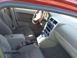 2009 Dodge Caliber SXT z VIN 1B3HB48A39D222766, wystawiony jako IAAI lot #43446903 z przebiegiem 101 175 mil mil oraz . Historia ofert i sprzedaży dostępna na DreamBid. Obrazek 5.