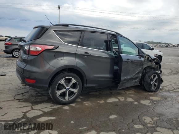 ✅ 2017 Ford Escape SE • VIN: 1FMCU0G97HUE22627 • Lot: 62409775. Wystawiony na Copart z przebiegiem 77 494 mil. Bezpłatny archiwum sprzedaży aukcyjnych z USA i szczegółowy raport historii pojazdu na DreamBid. Zdjęcie 3.