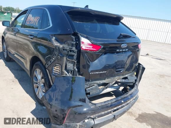 ✅ 2022 Ford Edge Titanium • VIN: 2FMPK4K98NBA94951 • Lot: 43255197. Wystawiony na IAAI z przebiegiem 70 473 mil. Bezpłatny archiwum sprzedaży aukcyjnych z USA i szczegółowy raport historii pojazdu na DreamBid. Zdjęcie 6.