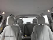 ✅ 2014 Toyota Sienna L • VIN: 5TDZK3DC0ES521084 • Lot: 91253955. Listed on Copart with 63,259 mi. Free auction sales archive from the USA and detailed vehicle history report at DreamBid. Image 10.