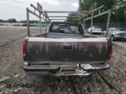 ✅ 1992 GMC Sierra 1500 • VIN: 1GTEC14K7NE501489 • Lot: 60296395. Wystawiony na Copart z przebiegiem 2 714 651 mil. Bezpłatny archiwum sprzedaży aukcyjnych z USA i szczegółowy raport historii pojazdu na DreamBid. Zdjęcie 6.