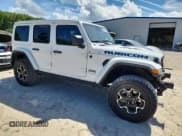 ✅ 2021 Jeep Wrangler Unlimited Rubicon • VIN: 1C4JJXR65MW826489 • Лот: 70136305. Опубликован ранее на Copart с пробегом 52 296 миль. Бесплатный доступ к архиву аукционных продаж из США и подробный отчёт об истории автомобиля на DreamBid. Изображение 4.
