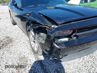 ✅ 2013 Dodge Challenger SXT • VIN: 2C3CDYAG2DH596472 • Lot: 43552887. Wystawiony na IAAI z przebiegiem 222 700 mil. Bezpłatny archiwum sprzedaży aukcyjnych z USA i szczegółowy raport historii pojazdu na DreamBid. Zdjęcie 6.