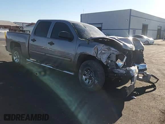 2012 Chevrolet Silverado 1500 LT z VIN 3GCPKSEAXCG238427, wystawiony jako Copart lot #67043445 z przebiegiem 90 423 mil mil oraz Szkoda całkowita • Salvage title. Historia ofert i sprzedaży dostępna na DreamBid. Obrazek 13.