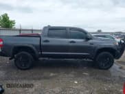 ✅ 2021 Toyota Tundra SR5 • VIN: 5TFDY5F1XMX025833 • Lot: 42442498. Listed on IAAI with 70,419 mi. Free auction sales archive from the USA and detailed vehicle history report at DreamBid. Image 13.