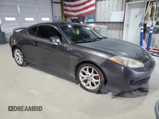 ✅ 2008 Hyundai Tiburon GT • VIN: KMHHN66F18U280756 • Лот: 81469935. Опубликован ранее на Copart с пробегом 227 955 миль. Бесплатный доступ к архиву аукционных продаж из США и подробный отчёт об истории автомобиля на DreamBid. Изображение 4.