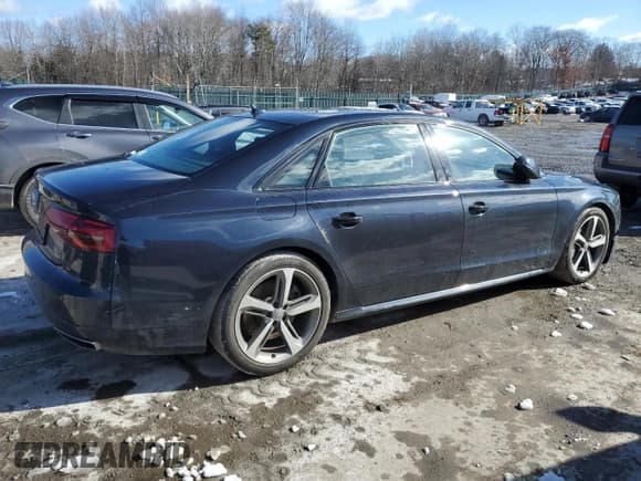 ✅ 2018 Audi A8 • VIN: WAU44AFD7JN000195 • Лот: 42916214. Опубликован ранее на Copart с пробегом 181 353 миль. Бесплатный доступ к архиву аукционных продаж из США и подробный отчёт об истории автомобиля на DreamBid. Изображение 3.