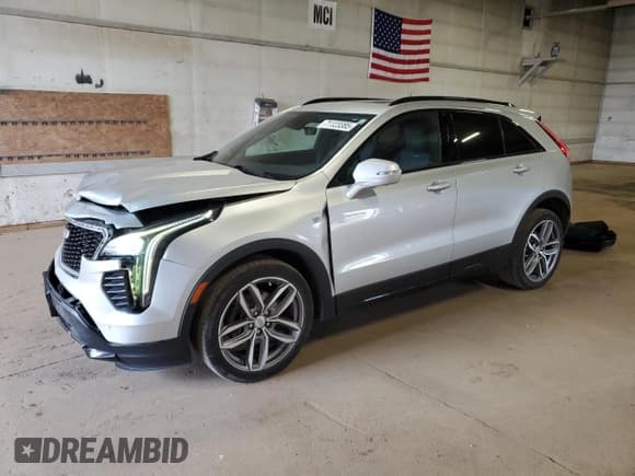 ✅ 2020 Cadillac XT4 AWD Sport • VIN: 1GYFZFR47LF133990 • Лот: 71123385. Опубликован ранее на Copart с пробегом 72 100 миль. Бесплатный доступ к архиву аукционных продаж из США и подробный отчёт об истории автомобиля на DreamBid. Изображение 1.