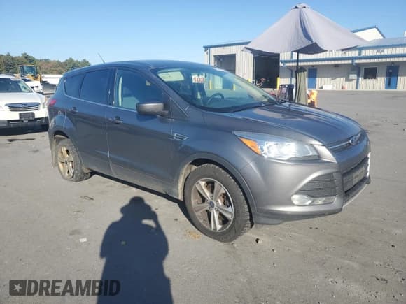 ✅ 2014 Ford Escape SE • VIN: 1FMCU9G99EUE18692 • Lot: 84992625. Listed on Copart with 164,344 mi. Free auction sales archive from the USA and detailed vehicle history report at DreamBid. Image 4.