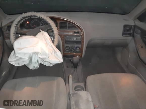 2002 Hyundai Elantra GLS z VIN KMHDN45D92U459167, wystawiony jako Copart lot #70104804 z przebiegiem Nie podano mil oraz Nie do naprawy • Non repairable. Historia ofert i sprzedaży dostępna na DreamBid. Obrazek 8.