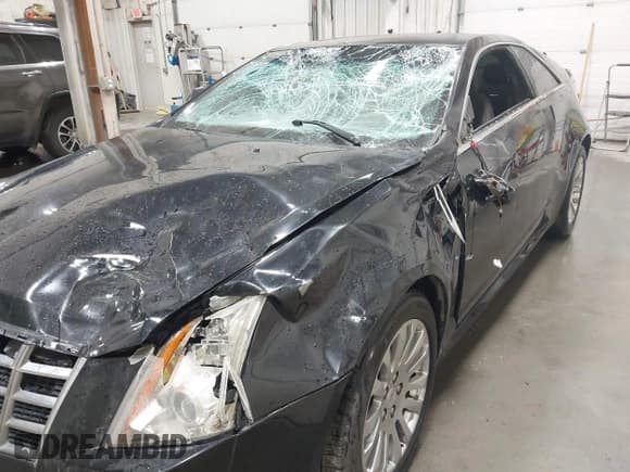 ✅ 2013 Cadillac CTS Performance • VIN: 1G6DJ1E32D0169937 • Lot: 43566951. Listed on IAAI with 96,503 mi. Free auction sales archive from the USA and detailed vehicle history report at DreamBid. Image 6.