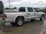 2002 Dodge Dakota SLT z VIN 1B7HL48X72S584617, wystawiony jako Copart lot #86504284 z przebiegiem 236 216 mil mil oraz Szkoda całkowita • Salvage title. Historia ofert i sprzedaży dostępna na DreamBid. Obrazek 3.