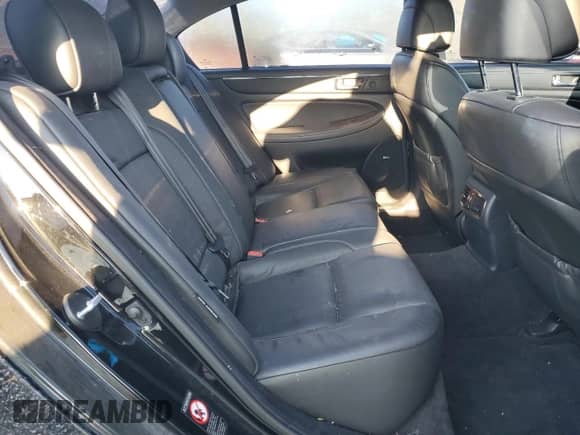 2009 Hyundai Genesis z VIN KMHGC46E09U039253, wystawiony jako Copart lot #71586734 z przebiegiem 133 576 mil mil oraz Szkoda całkowita • Salvage title. Historia ofert i sprzedaży dostępna na DreamBid. Obrazek 10.