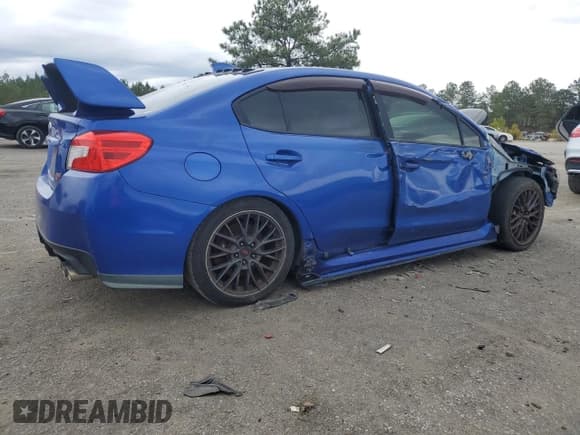 ✅ 2016 Subaru WRX STI • VIN: JF1VA2M69G9801888 • Lot: 45305515. Listed on Copart with 113,412 mi. Free auction sales archive from the USA and detailed vehicle history report at DreamBid. Image 3.