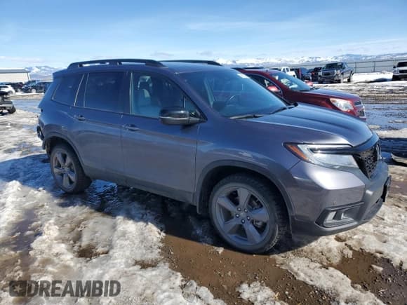 ✅ 2021 Honda Passport Touring • VIN: 5FNYF8H99MB006096 • Lot: 46292925. Listed on Copart with 40,809 mi. Free auction sales archive from the USA and detailed vehicle history report at DreamBid. Image 4.