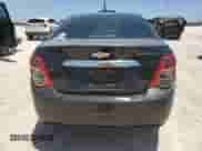 2014 Chevrolet Sonic LT с VIN 1G1JC5SH1E4122774, выставлен на аукционе Copart как лот 61878944 с пробегом Не указан миль и Списание • Salvage title. История ставок и продаж доступна на DreamBid. Изображение 6.