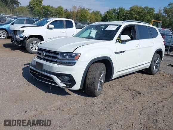 ✅ 2018 Volkswagen Atlas SE • VIN: 1V2PR2CA1JC595668 • Lot: 43434478. Listed on IAAI with 125,744 mi. Free auction sales archive from the USA and detailed vehicle history report at DreamBid. Image 2.