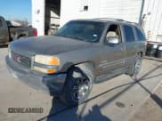 ✅ 2001 GMC Yukon SLT • VIN: 1GKEK13T11R164029 • Lot: 41518776. Listed on IAAI with 329,836 mi. Free auction sales archive from the USA and detailed vehicle history report at DreamBid. Image 2.