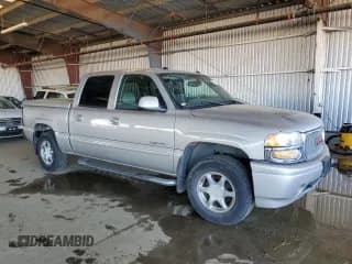 ✅ 2005 GMC Sierra Denali • VIN: 2GTEK63NX51376923 • Лот: 82708814. Опубликован ранее на Copart с пробегом 214 768 миль. Бесплатный доступ к архиву аукционных продаж из США и подробный отчёт об истории автомобиля на DreamBid. Изображение 4.