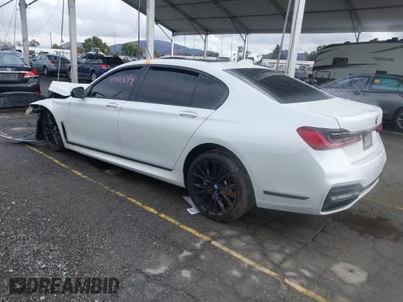 ✅ 2022 BMW 7 Series 740i • VIN: WBA7T2C00NCK26779 • Lot: 43443074. Listed on IAAI with Not provided. Free auction sales archive from the USA and detailed vehicle history report at DreamBid. Image 3.